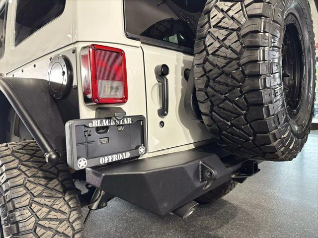 used 2012 Jeep Wrangler Unlimited car, priced at $25,990