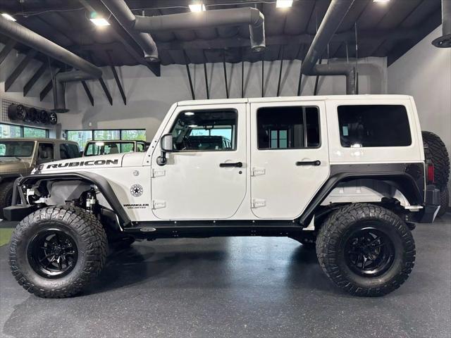 used 2012 Jeep Wrangler Unlimited car, priced at $25,990