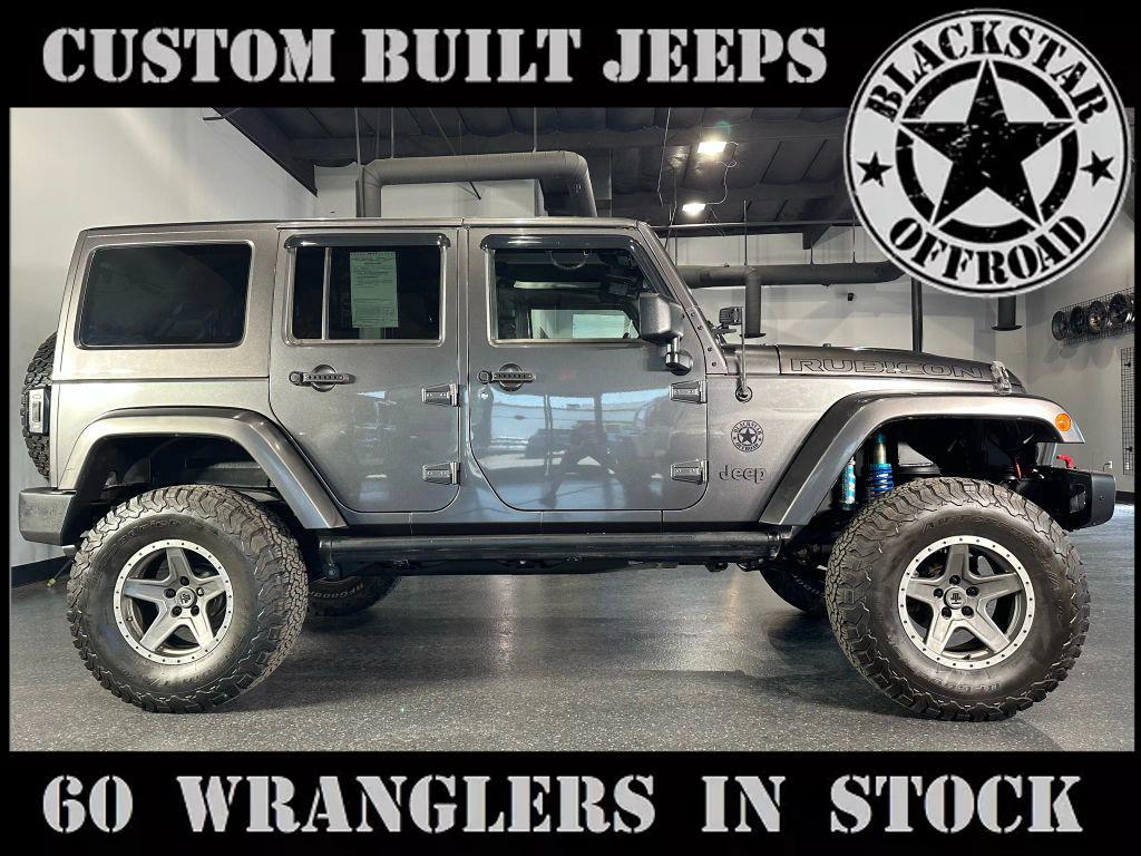 used 2014 Jeep Wrangler Unlimited car, priced at $28,990