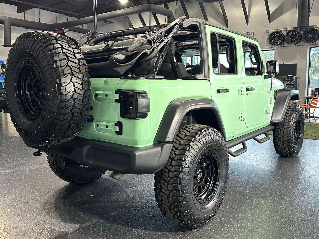 used 2021 Jeep Wrangler Unlimited car, priced at $32,990