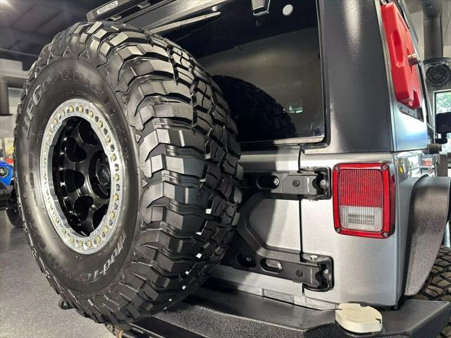 used 2014 Jeep Wrangler Unlimited car, priced at $34,990