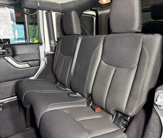 used 2014 Jeep Wrangler Unlimited car, priced at $34,990