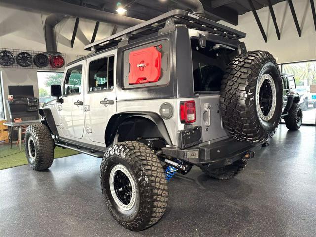 used 2014 Jeep Wrangler Unlimited car, priced at $34,990