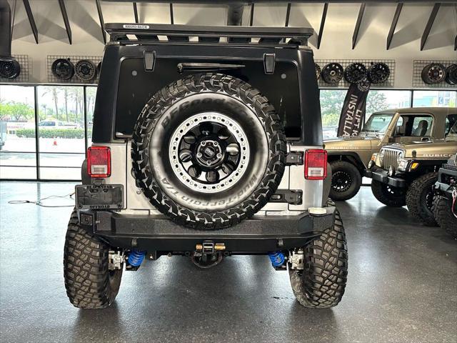 used 2014 Jeep Wrangler Unlimited car, priced at $34,990