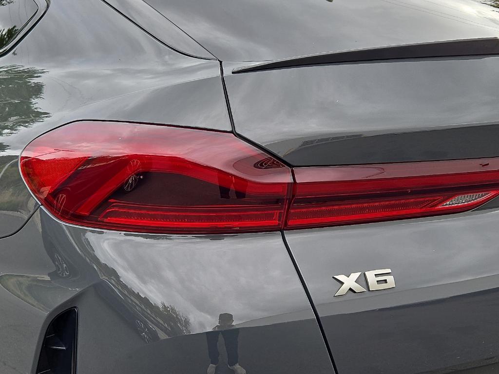 used 2023 BMW X6 car, priced at $57,950