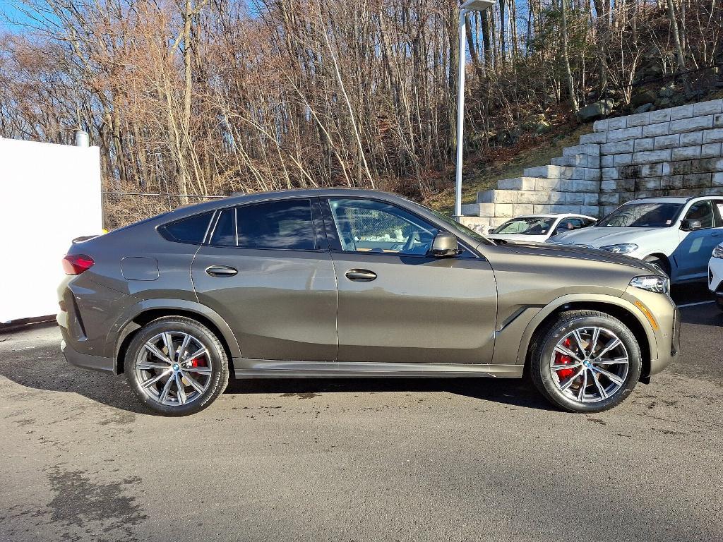 new 2025 BMW X6 car, priced at $85,275