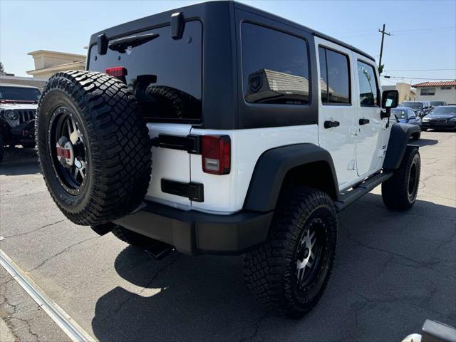 used 2016 Jeep Wrangler Unlimited car, priced at $30,995