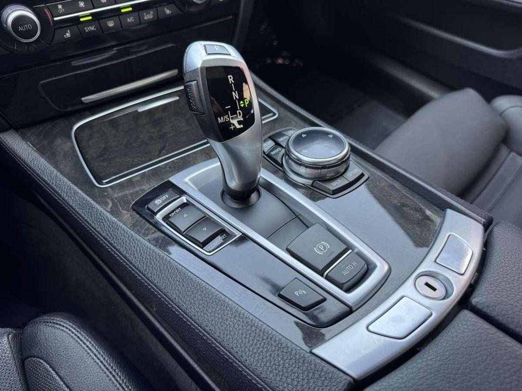 used 2014 BMW 740 car, priced at $18,995