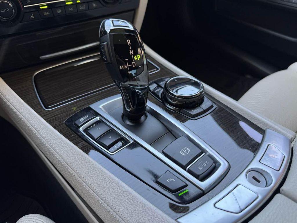 used 2015 BMW 750 car, priced at $18,995