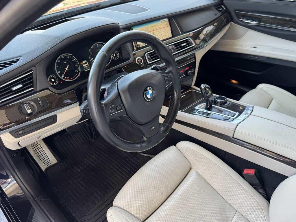 used 2015 BMW 750 car, priced at $18,995
