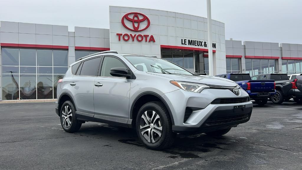 used 2018 Toyota RAV4 car, priced at $13,990