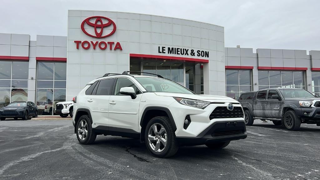 used 2021 Toyota RAV4 Hybrid car, priced at $34,990