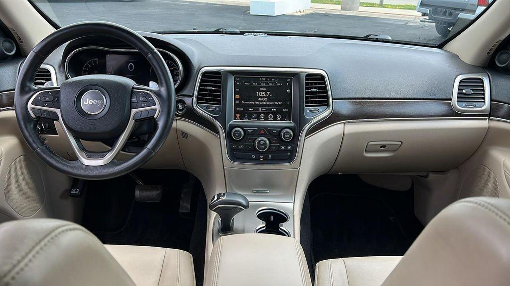 used 2014 Jeep Grand Cherokee car, priced at $13,990