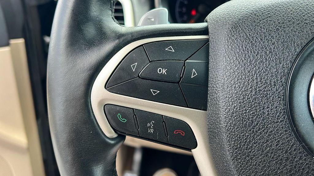 used 2014 Jeep Grand Cherokee car, priced at $13,990