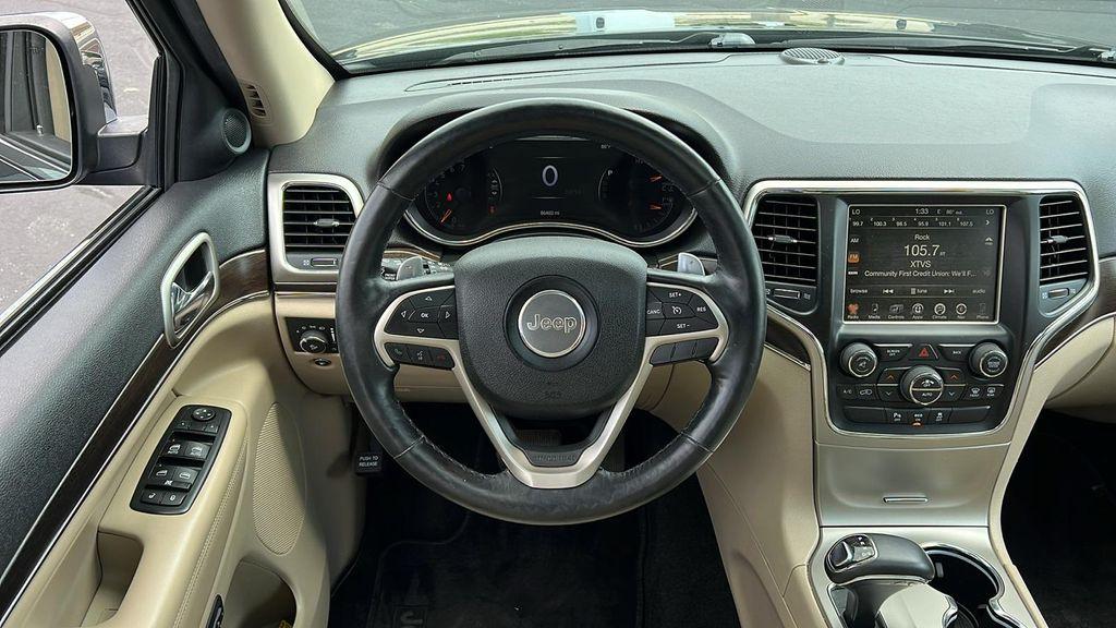 used 2014 Jeep Grand Cherokee car, priced at $13,990