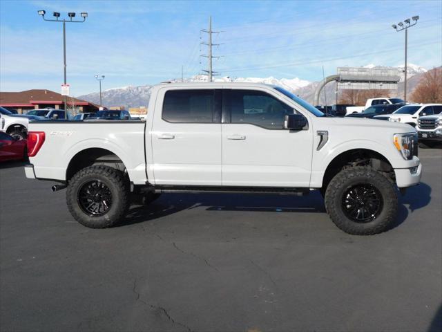 used 2023 Ford F-150 car, priced at $58,900