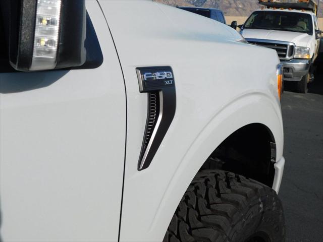 used 2023 Ford F-150 car, priced at $58,900