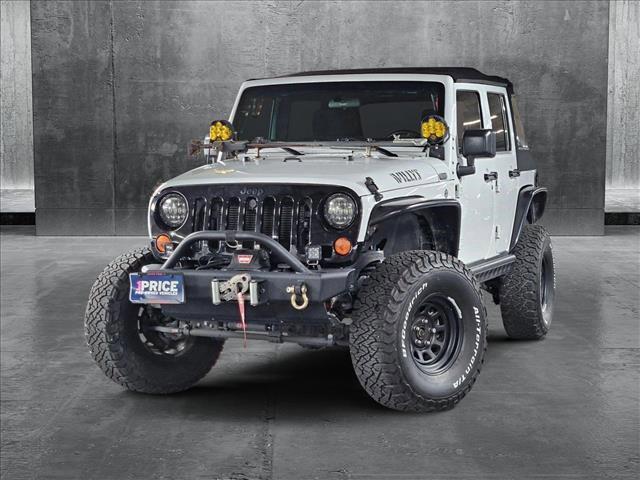 used 2016 Jeep Wrangler Unlimited car, priced at $21,426