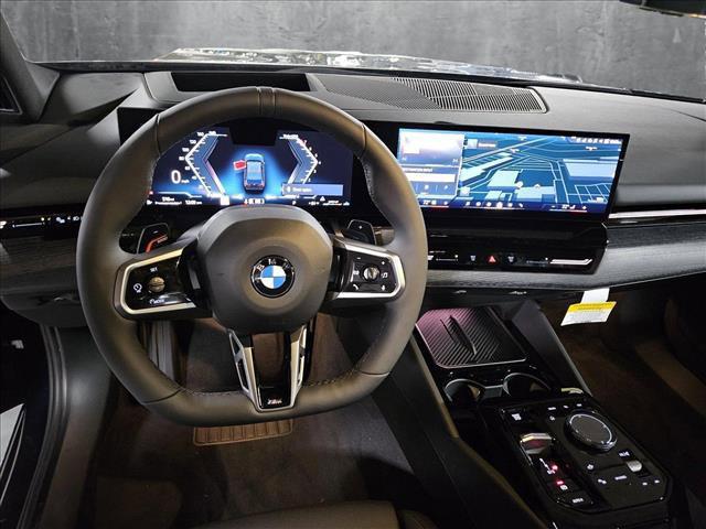 new 2025 BMW 530 car, priced at $68,375