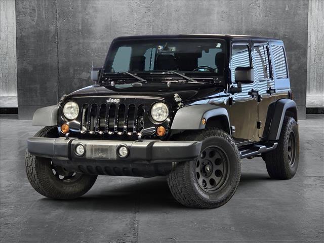 used 2013 Jeep Wrangler Unlimited car, priced at $19,990