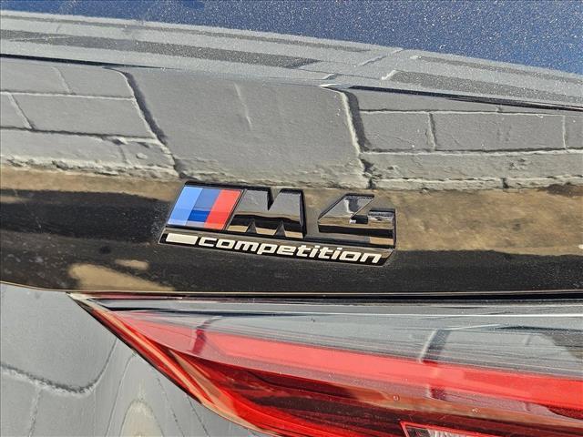 used 2023 BMW M4 car, priced at $70,876