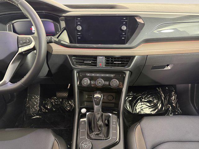 used 2023 Volkswagen Taos car, priced at $27,378