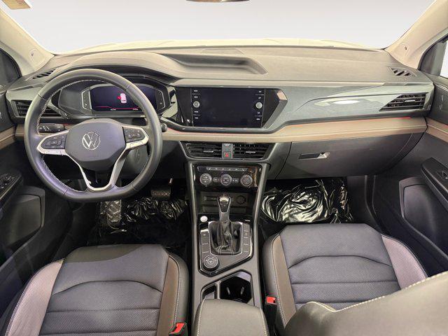 used 2023 Volkswagen Taos car, priced at $27,378