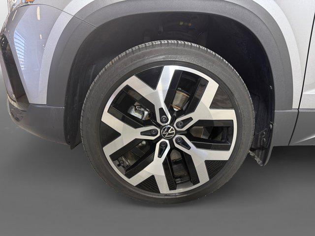 used 2023 Volkswagen Taos car, priced at $27,378