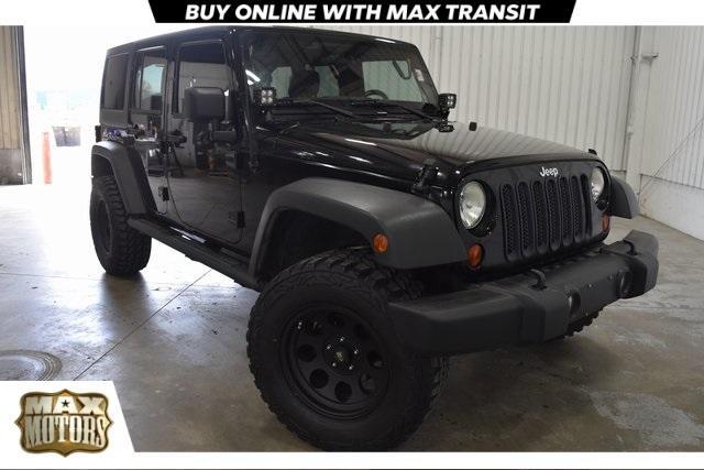 used 2011 Jeep Wrangler Unlimited car, priced at $18,986