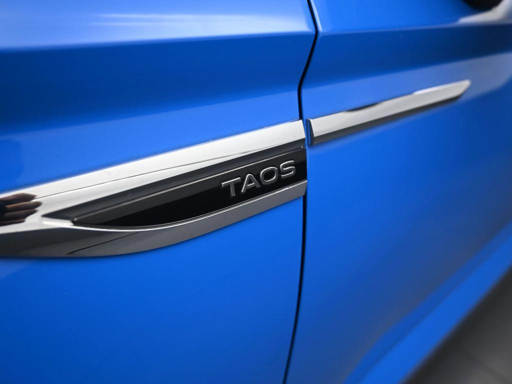 used 2023 Volkswagen Taos car, priced at $20,994