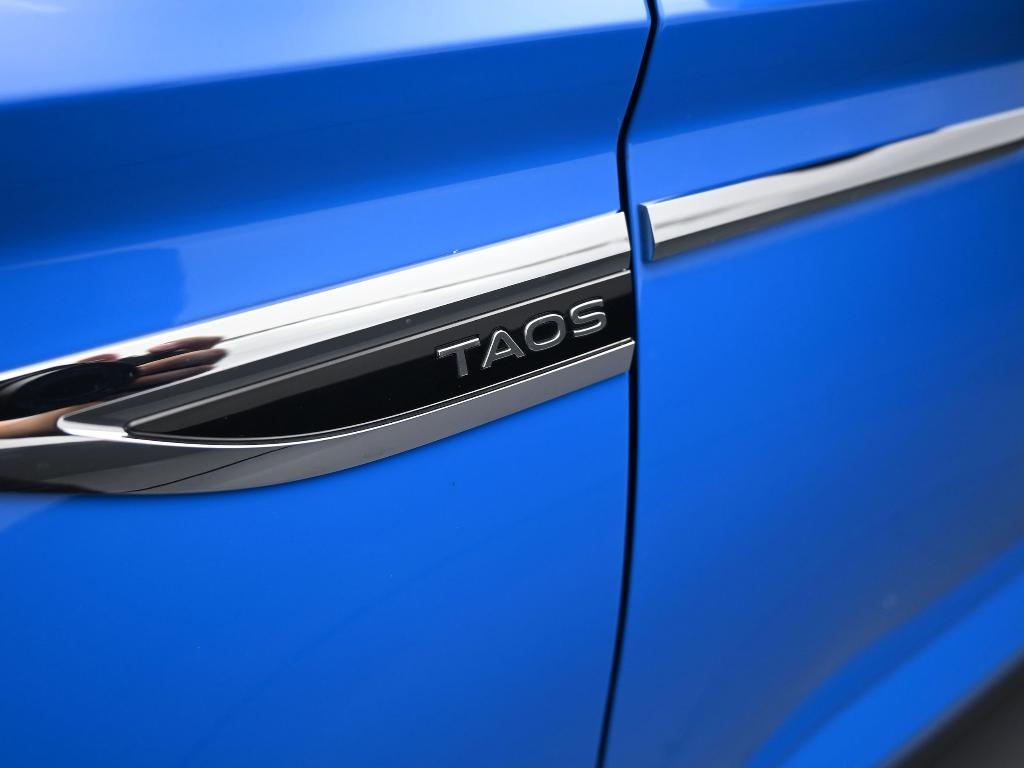 used 2023 Volkswagen Taos car, priced at $19,995