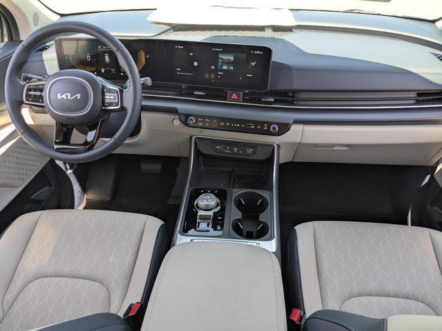 new 2025 Kia Carnival Hybrid car, priced at $43,144