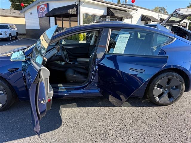 used 2023 Tesla Model 3 car, priced at $32,460