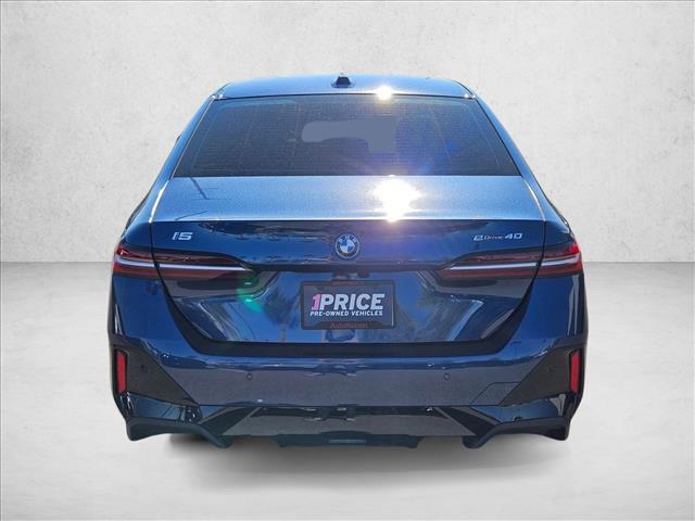 used 2025 BMW i5 car, priced at $46,819