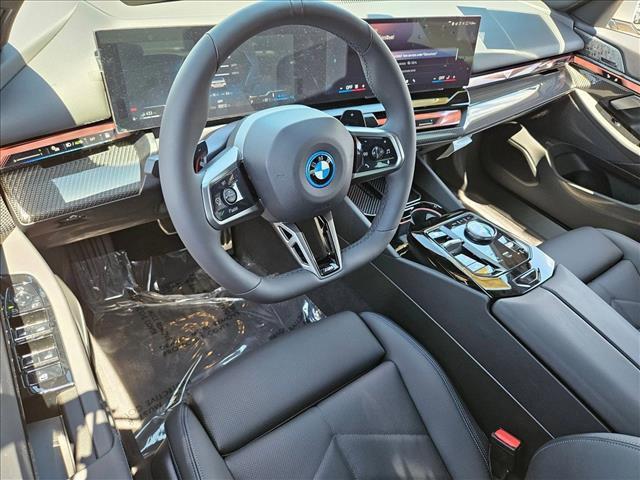 new 2026 BMW 550e car, priced at $84,440