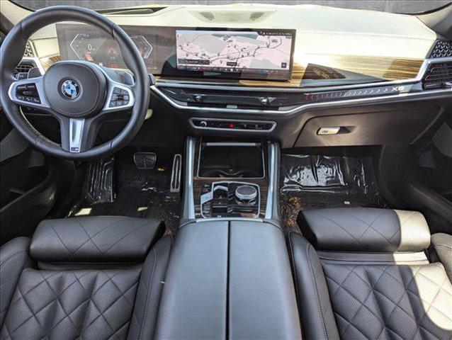 used 2025 BMW X6 car, priced at $62,987