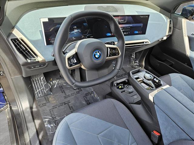 new 2024 BMW iX car, priced at $92,395