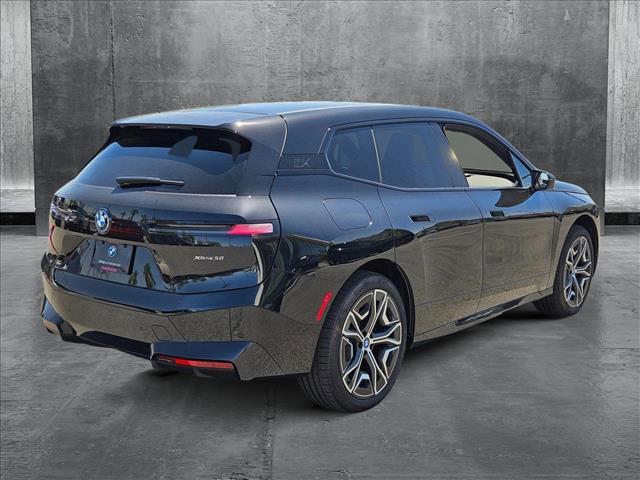 new 2025 BMW iX car, priced at $97,175