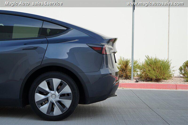 used 2023 Tesla Model Y car, priced at $32,950