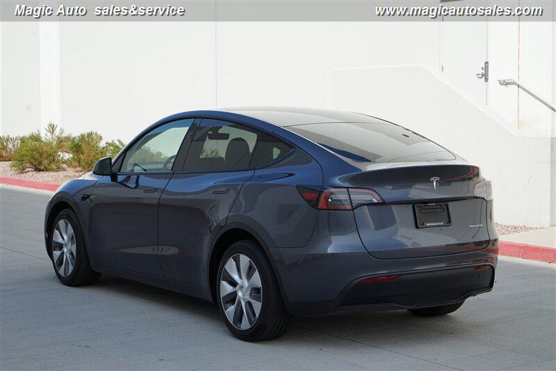 used 2023 Tesla Model Y car, priced at $32,950