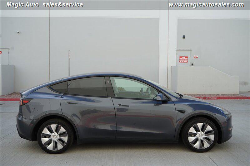 used 2023 Tesla Model Y car, priced at $32,950