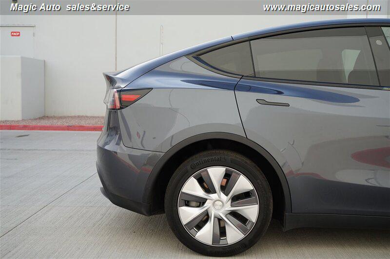 used 2023 Tesla Model Y car, priced at $32,950