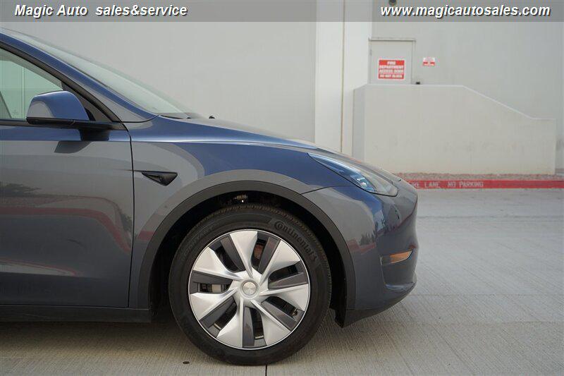 used 2023 Tesla Model Y car, priced at $32,950