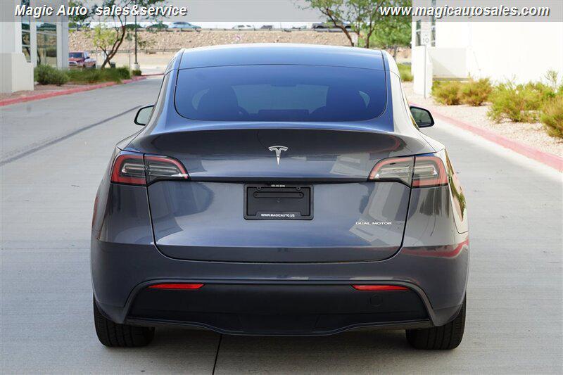 used 2023 Tesla Model Y car, priced at $32,950