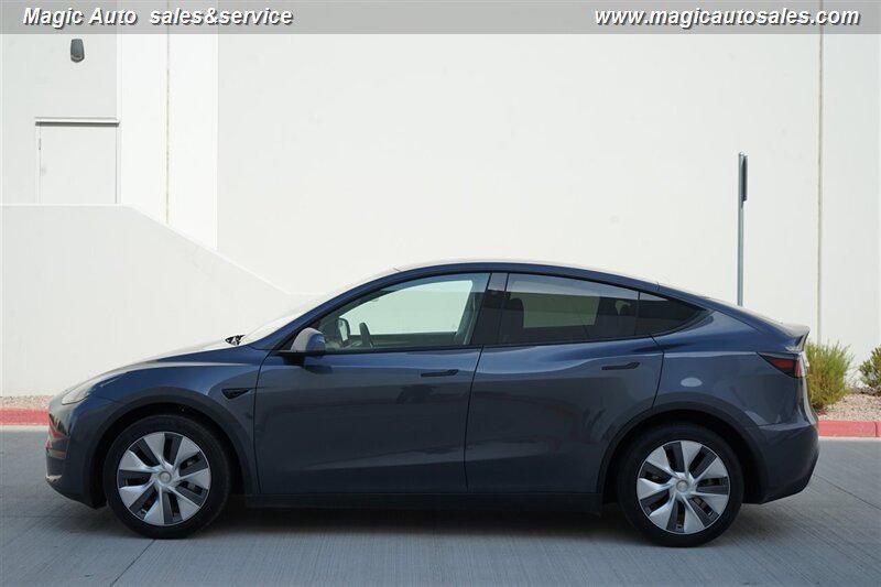used 2023 Tesla Model Y car, priced at $32,950