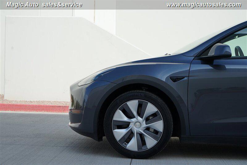 used 2023 Tesla Model Y car, priced at $32,950