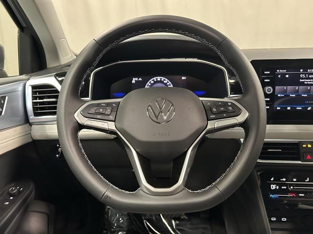 new 2025 Volkswagen Taos car, priced at $33,306