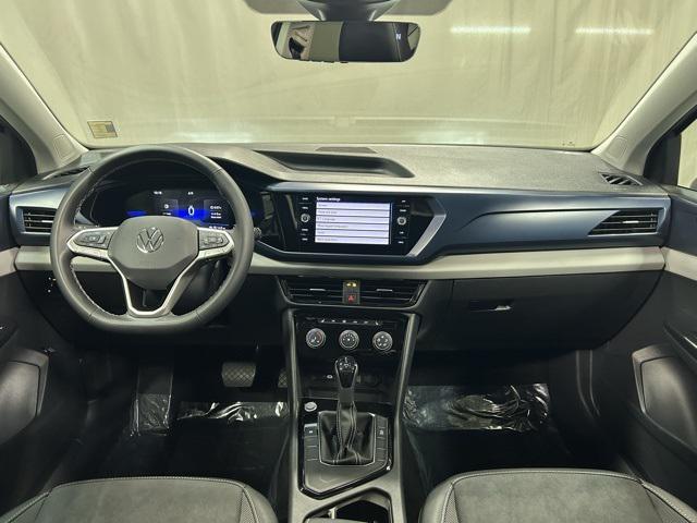used 2023 Volkswagen Taos car, priced at $21,500
