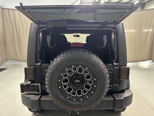 used 2014 Jeep Wrangler Unlimited car, priced at $14,550