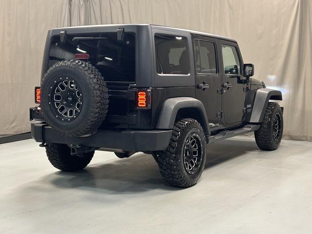 used 2014 Jeep Wrangler Unlimited car, priced at $14,550